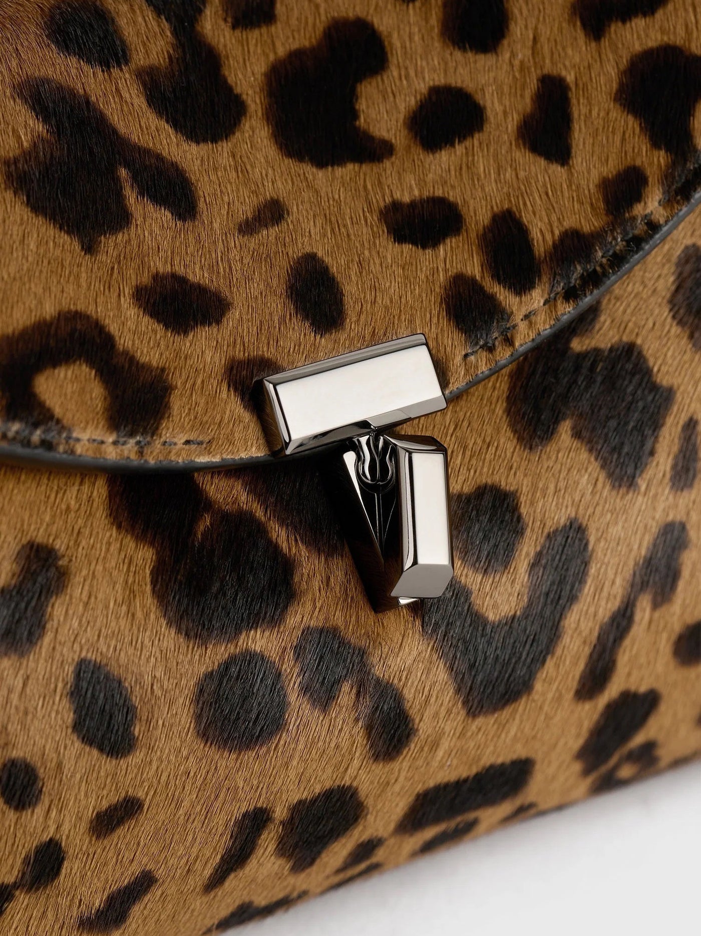 Mini T-Lock Pony Hair Clutch in Leopard